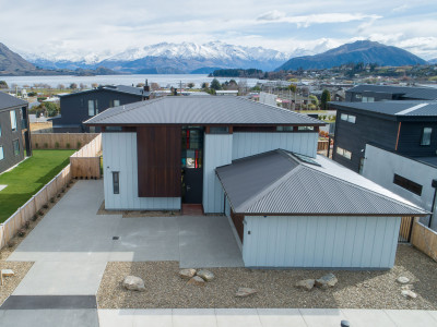 This icy shade of blue helps this new build blend into the Wanaka landscape This icy shade of blue helps this new build blend into the Wanaka landscape