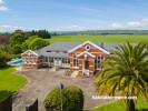 Exterior, house exterior, exterior featuring red brick and grey roof in Resene Grey Friars