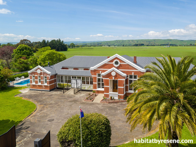 Exterior, house exterior, exterior featuring red brick and grey roof in Resene Grey Friars
