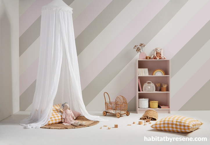 Neutral kid's bedroom, child's bedroom featuring painted wall stripes