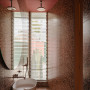 Bathroom with red-toned tiles