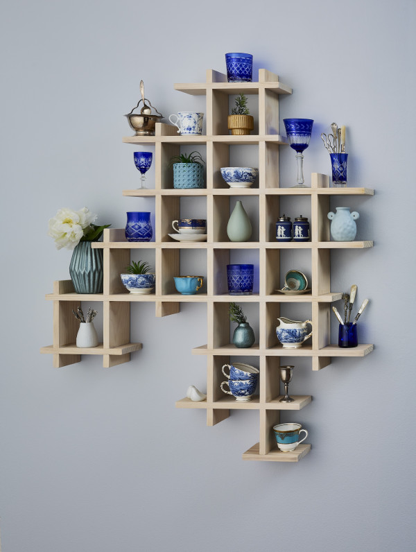 An abstract shelf filled with various trinkets