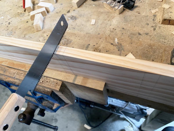 A saw cutting wood