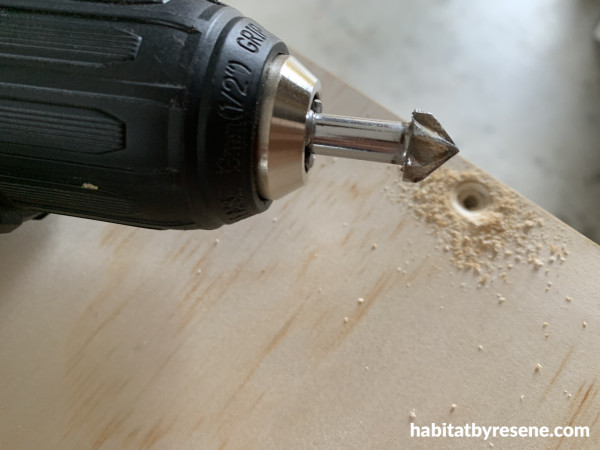 A drill with a large drill bit