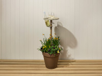 Create a rustic outdoor wine glass holder