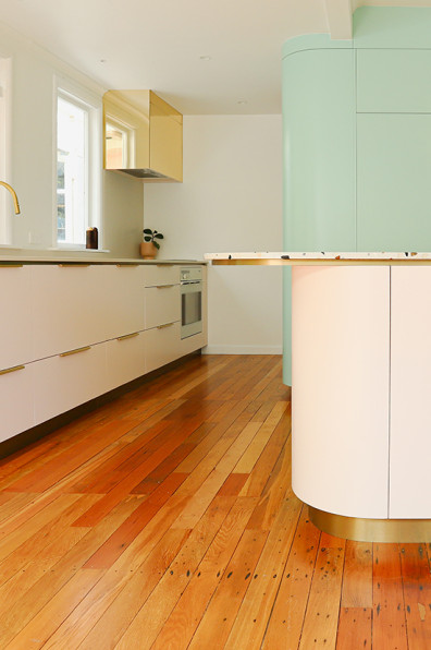 Minty greens and blushing pinks bring this art deco home to life