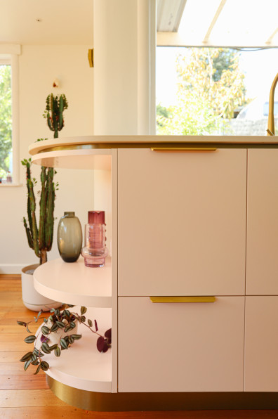 Minty greens and blushing pinks bring this art deco home to life