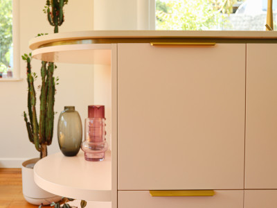 Minty greens and blushing pinks bring this art deco home to life