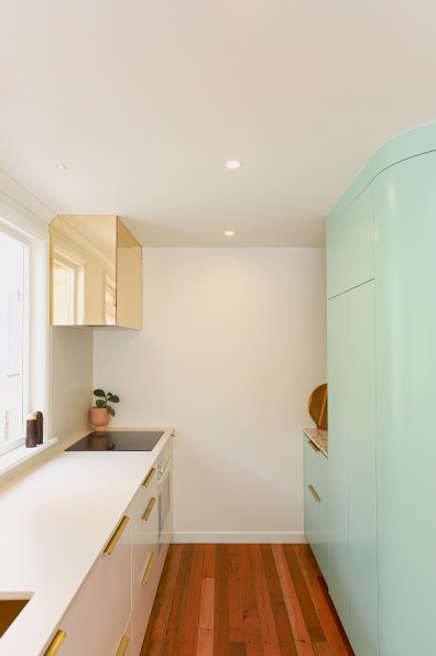 Minty greens and blushing pinks bring this art deco home to life