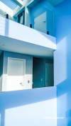 Blue living space and hallway, blue hallway featuring Resene Perano