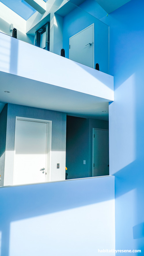 Blue living space and hallway, blue hallway featuring Resene Perano