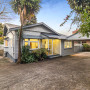 House exterior painted in Resene Half Silver Chalice