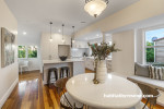 Open plan kitchen and dining painted in Resene Black White