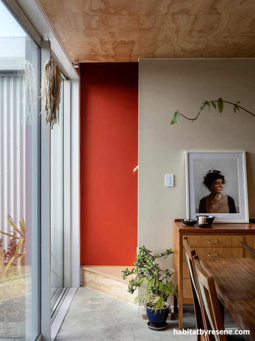 Morccoan-inspired entrance painted in Resene Red Red Red and wall in Resene Merino