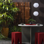 Japanese-inspired patio with walls stained in Resene Woodsman Charred Black
