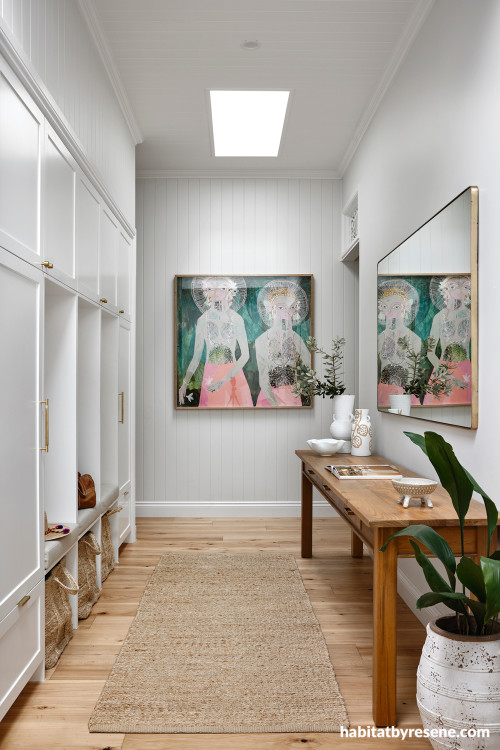 Hallway and storage area painted in Resene Wan White