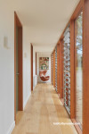 Hallway painted in Resene Quarter Thorndon Cream and doors in Resene Double Lemon Grass