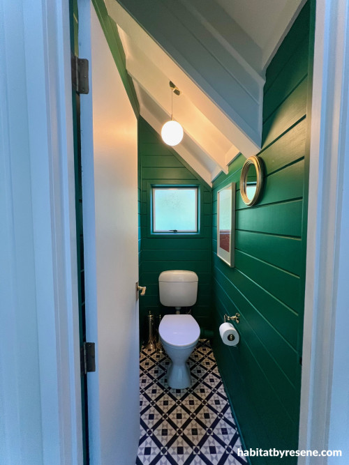 toilet is now modern and bright, painted in Resene Fun Green with Resene Quarter Rice Cake on doors and Resene Ceiling Paint White on the ceiling.&nbsp;