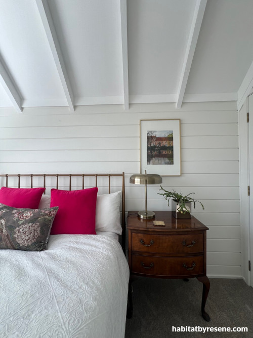 Guest bedroom in Resene Rice Cake with the ceiling highlighted in Resene Ceiling Paint White.