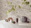 Hallway featuring neutral wallpaper with floral pattern