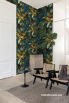 Sitting room featuring nature-inspired wallpaper