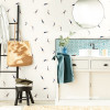 Bathroom with Resene Wallpaper Collection featuring people swimming