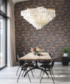 Dining room featuring wallpaper in a brick pattern