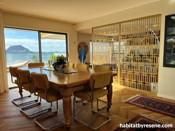 Dining area featuring Resene Wheatfield and Resene Half Wheatfield