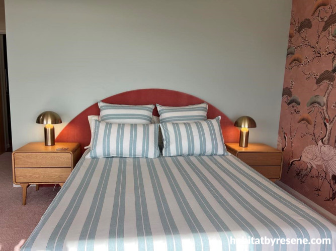 Bedroom featuring Resene wallpaper and painted in Resene Rainee