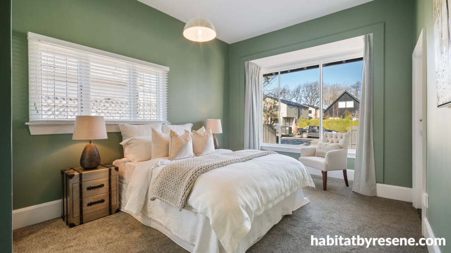 Master bedroom painted in Resene Xanadu and Resene Black White