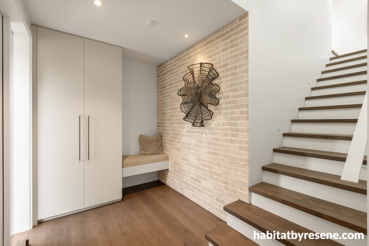 Neutral entranceway featuring walls in Resene Half Wan White
