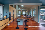 Hardwood natural floor in kitchen with blue walls