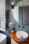 Charming bathroom painted in relaxing blue colour