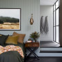 Bedroom in earthy tones create a relaxing feel