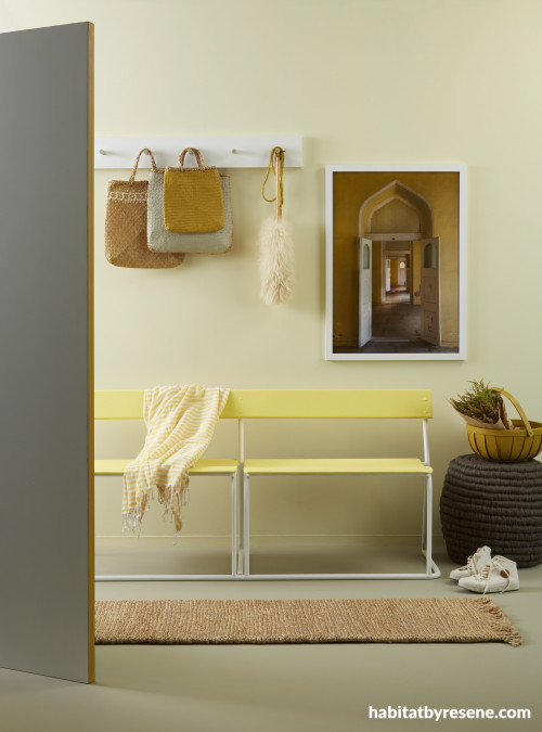 Warm yellow and gold tones in home entry