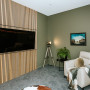 Media room, earthy green media room, media room featuring Resene Raptor