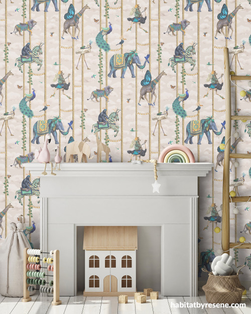 Kids room featuring whimsical wallpaper