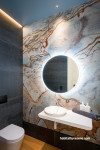 Luxurious bathroom drenched in moody tones