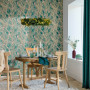 Wallpaper featuring green feather design in rustic dining space