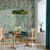 Wallpaper featuring green feather design in rustic dining space