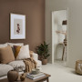 Earthy tones on walls and on the furniture create for a cosy space