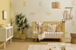 Bright & playful nursery painted in bright yellow tones