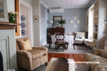 Dining and living room painted in Resene Half Periglacial Blue and Resene Quarter Lemon Grass