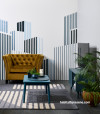 Living room featuring a cityscape mural painted in multiple Resene colours