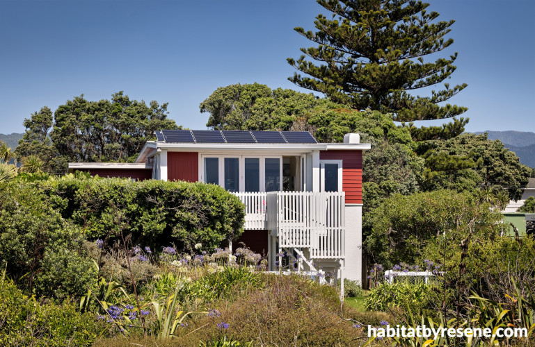 House painted in Red Oxide and Sea Fog