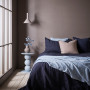 Bedroom with walls painted in Resene Oilskin