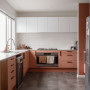Kitchen cabinetry featuring Resene Summer Rose, surrounding walls and ceiling in Half Black White.