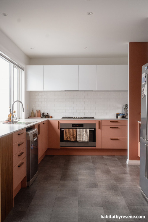 Kitchen cabinetry featuring Resene Summer Rose, surrounding walls and ceiling in Half Black White.