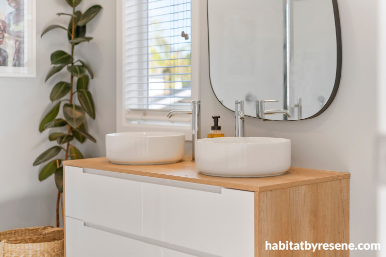 Bathroom featuring walls in soft icy blue
