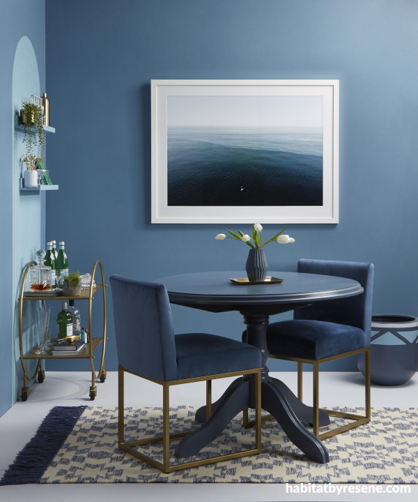 This beautiful dining room evokes a soothing sense of being by the sea. The walls are painted in Resene Seachange with arch and shelves in Resene Awash, floor in Resene Breathless, table in Resene Rhino.